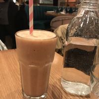 The Wizard smoothie with a paper straw at Fresh Kitchen & Juice Bar in Toronto