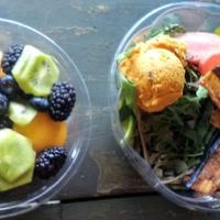 Fruit salad and a seasonal greens salad with hummus purchased at Outdated Lite in November 2019. at Outdated Lite in Kingston