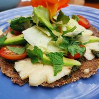 Raw vegan pizza with a pesto base 😋 at Kin Cafe in Seminyak