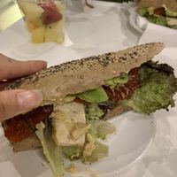 Doesn’t look pretty, but it was good! (Tofu, avocado, dried tomatoes, olive pasta and lettuce Sandwich) at Time Cafe in Naples