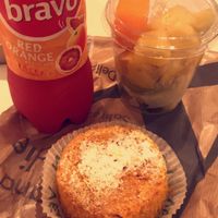 Drink, fruit cup and carrot cake  at Time Cafe in Naples