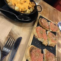 Pan de Barcelona and patatas con mojo  at Lola's Tapas Restaurant in Bournemouth