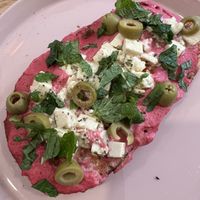 Beetroot hummus on toast   at Roots Plant-Based Cafe in Da Nang