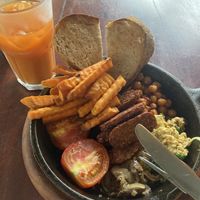Juice and full breakfast   at Roots Plant-Based Cafe in Da Nang