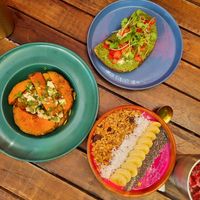 Pumpkin Wedges, basil Pesto toast, tropical smoothie bowl at Roots Plant-Based Cafe in Da Nang