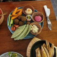 sharing platter (falafel, pita, veggies, sweet potato fries, hummus and vegan feta) at Roots Plant-Based Cafe in Da Nang