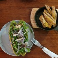 garlic bread and pesto/cheese baguette at Roots Plant-Based Cafe in Da Nang