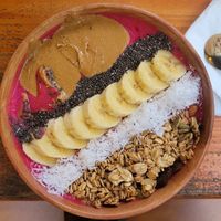 smoothie bowl with dragon fruit (and added peanut butter) at Roots Plant-Based Cafe in Da Nang