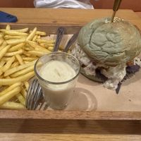 swiss cheese burger without salad  at Roots Plant-Based Cafe in Da Nang