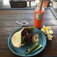 Falafel pita and toga & shine juice  at Roots Plant-Based Cafe in Da Nang