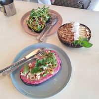 Avocado shiitake toast, beetroot hummus toast and acai bowl at Roots Plant-Based Cafe in Da Nang