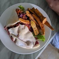 Falafel pita with sweet potato fries at Roots Plant-Based Cafe in Da Nang