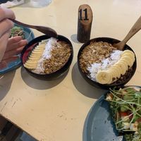 Tropical and Rise up smoothie bowls; the tropical is very fresh and the rise up is thick and tasty! at Roots Plant-Based Cafe in Da Nang