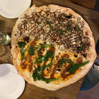 half nduja and broccoli / half mushroom and truffle glaze at Homeslice - Neal's Yard in London