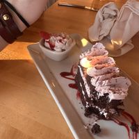 Raspberry Chocolate cake w/ vanilla began gelato. So tasty    at Cafe Manna in Brookfield