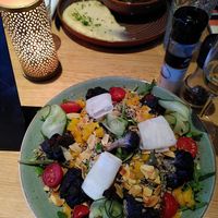 Quinoa salad and stew at Focus Eten en Drinken in Arnhem