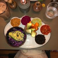 Their platter with different dips including hummus, edamame hummus and beetroot hummus 

(Asked for a salad instead of bread On the side) at Cafe Blå in Copenhagen