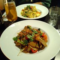 Vegan chicken (this side) and wok of the house (opposite). at Nha Trang Restaurang in Stockholm