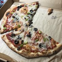 Pizza with vegan cheese, black olives, and green pepper at Mod Pizza - E Broadway in Tucson