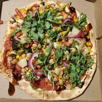 Arugala & Fig Sauce added after baked at Mod Pizza - E Elliot in Tempe