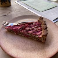 Rhubarb pie with almond: decent, but a bit sour and with a quite hard crust. at Rabarber in Utrecht