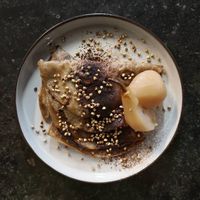 Buckwheat pancakes with homemade Nutella, stewed cardamom pears and toasted buckwheat groats (vegan!) at Rabarber in Utrecht