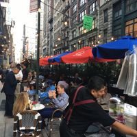 Outdoor seating--fun bar culture, ideally suited for relaxing drinks (but less suited for those seeking vegan meals) at Oscar Wilde in New York City