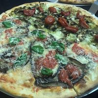 Vegan pizza (with vegan Parmesan) at Il Padovano in Lisbon