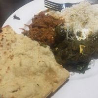 An order of naan is enough for two; the only vegan one is the first one listed on the menu. at The Masala Twist in Oxnard