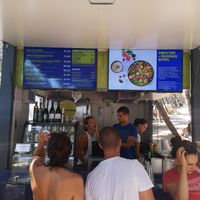 Happy staff at BioMania Street Food in Bol