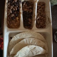 Kids meal (comes with chips and a drink) got the sofritas, black beans, pinto beans, and a side of guac (for a charge).   at Chipotle in Lake Grove