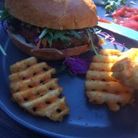 Vegan option burger with waffle fries. at The Bridge Hotel in Castlemaine