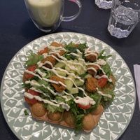 Falafel bubble waffle and iced matcha latte (with oat milk)  at Cafe Nisse in Imatra