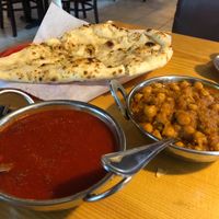 Tomato soup (cooked with my old Indian spices and garlic) Chana Masala ( fresh vegetables with Indian spices) and Garlic Naan. at Taste of India in Reno