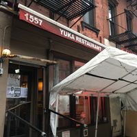 Front entrance (with outdoor seating) at Yuka in New York City