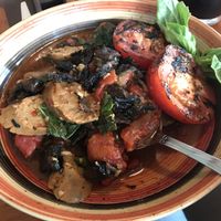 Vegan sausage mushroom eggplant tomato dish at DeepWater Brewing Company in Blue Hill