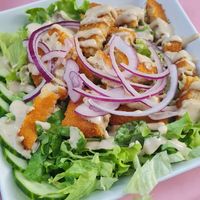 Salat mit Schnitzel at Neue Republik Reger in Berlin