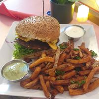 Cheese burger with small fries at Neue Republik Reger in Berlin