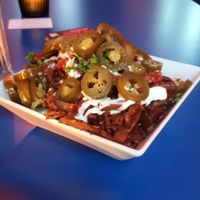 Poutine with pulled Seitan and Jalapeños at Neue Republik Reger in Berlin