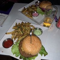 cheezy burger and pulled seitan burger, fries, dill mayo, ketchup, rose horseradish, and thousand island dip at Neue Republik Reger in Berlin
