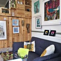 interior - so much gorgeous artwork! at Infusion Cafe in Exmouth