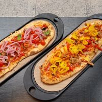 My custom pizzas with vegan mozzarella. at &pizza - E St in Washington