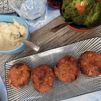 Tomato balls, hummus and parsley dip at To Mikraki in Syros