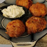 Supposedly "vegan" tomato balls but served with non-vegan tzatziki at To Mikraki in Syros