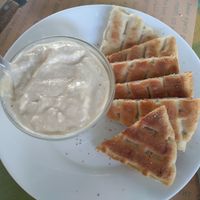 Hummus with pita bread at To Mikraki in Syros