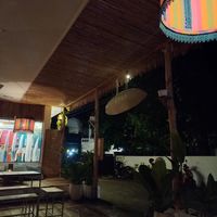 Cozy location at the front where you sit on cushions on the floor at Koha Surf Cafe & Lounge in Unawatuna