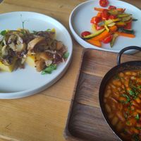 Polenta with shrooms, baked beans and grilled veggies at Lačni Kekec in Kranjska Gora