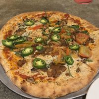 A keen eye will notice the geometric diversity among the “slices” here    at Flatbread Pizza in Paia