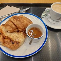 Breakfast / vegan croissant and coffee with oat milk (0,10€ extra for pb milk) at Curcuma Green Food in Burgos