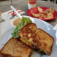 FLT and braised white beans, plus almost-gone spicy hummus at Zoës Kitchen - Rice Village in Houston